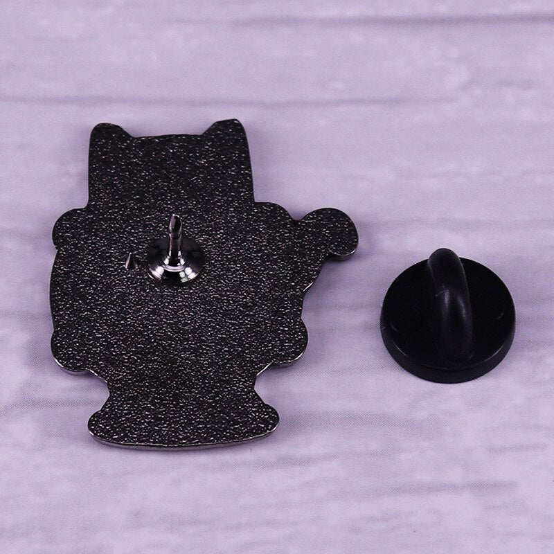 The magic crystal ball brooch cat reminds you that even though life can be difficult at times, the future is bright